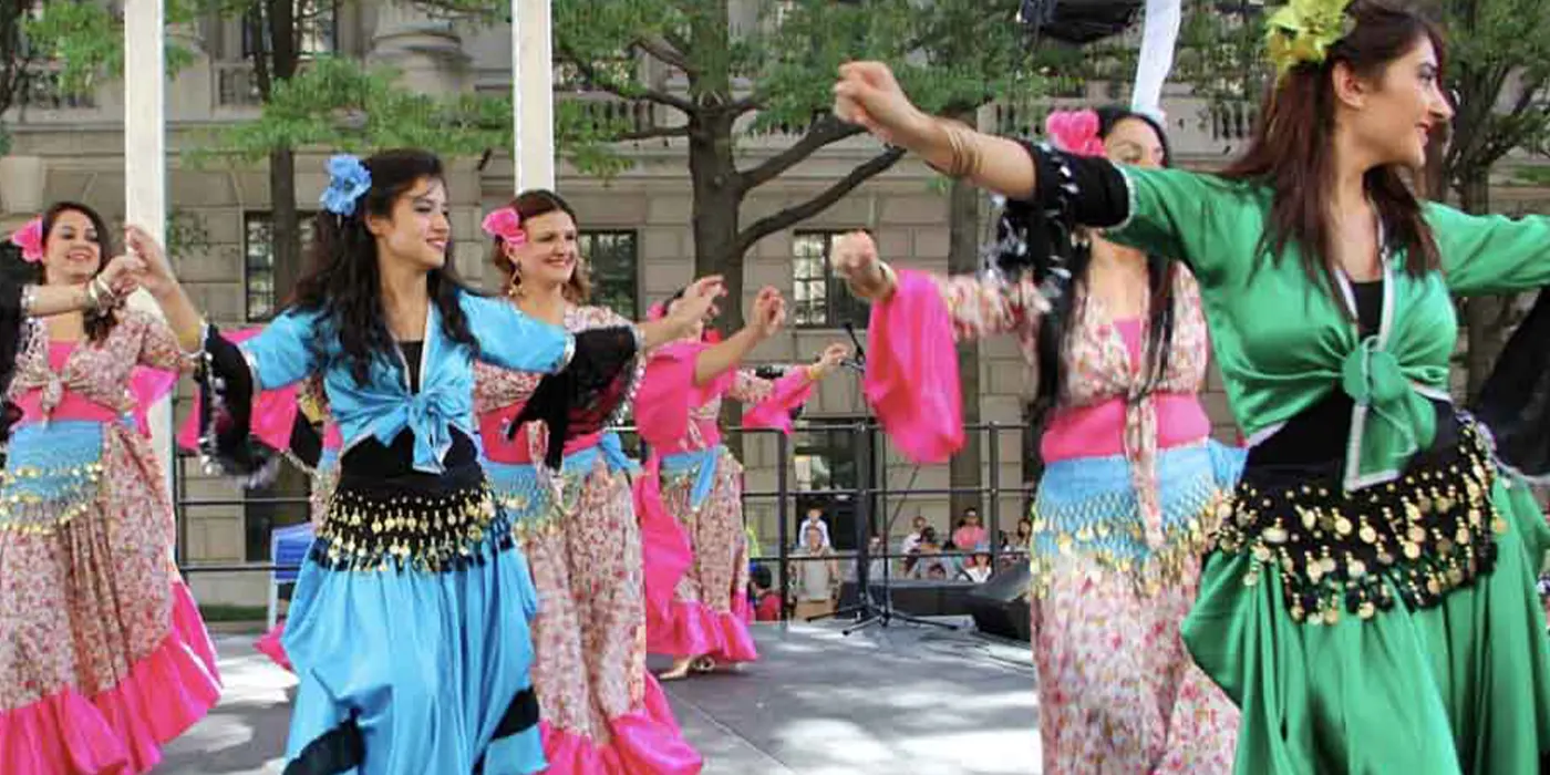 Visitors enjoying 'A Day in Türkiye: Turkish Festival' in Washington, DC, featuring Turkish music, dance, cuisine, and cultural exhibitions.